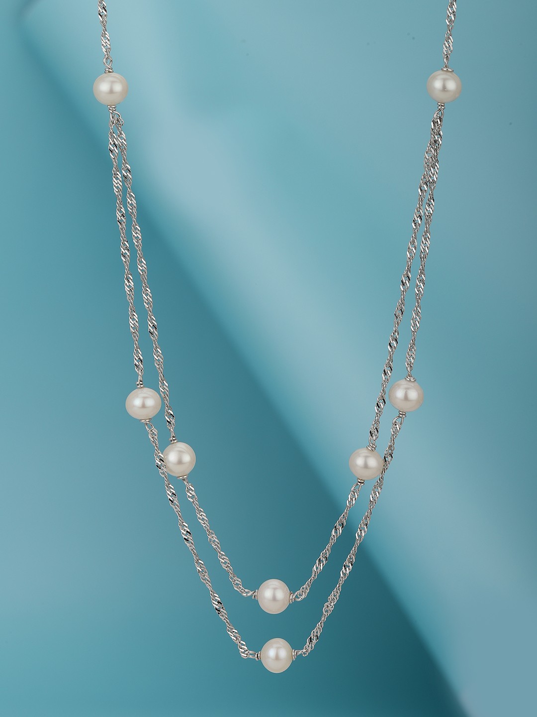 Carlton London 925 Sterling Silver Inline Pearl with Rhodium Plated Double Chain Necklace
Carlton London 925 Sterling Silver Inline Pearl with Rhodium Plated Double Chain Necklace