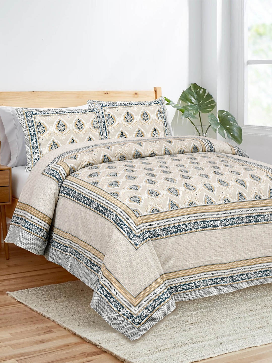 Stylespace by Isha White & Blue Ethnic Motifs 250 TC King Bedsheet with 2 Pillow Covers
Stylespace by Isha White & Blue Ethnic Motifs 250 TC King Bedsheet with 2 Pillow Covers