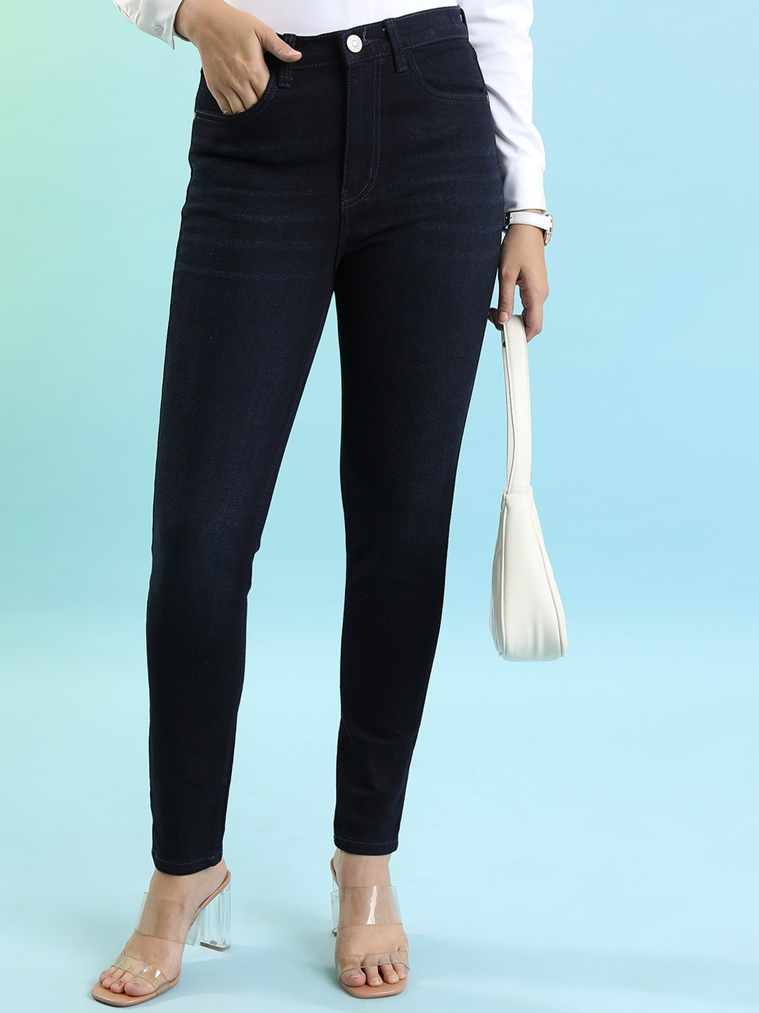 Tokyo Talkies Women Mid-Rise Clean Look Skinny Fit Light Fade Stretchable Jeans, Navy blue
Tokyo Talkies Women Mid-Rise Clean Look Skinny Fit Light Fade Stretchable Jeans, Navy blue