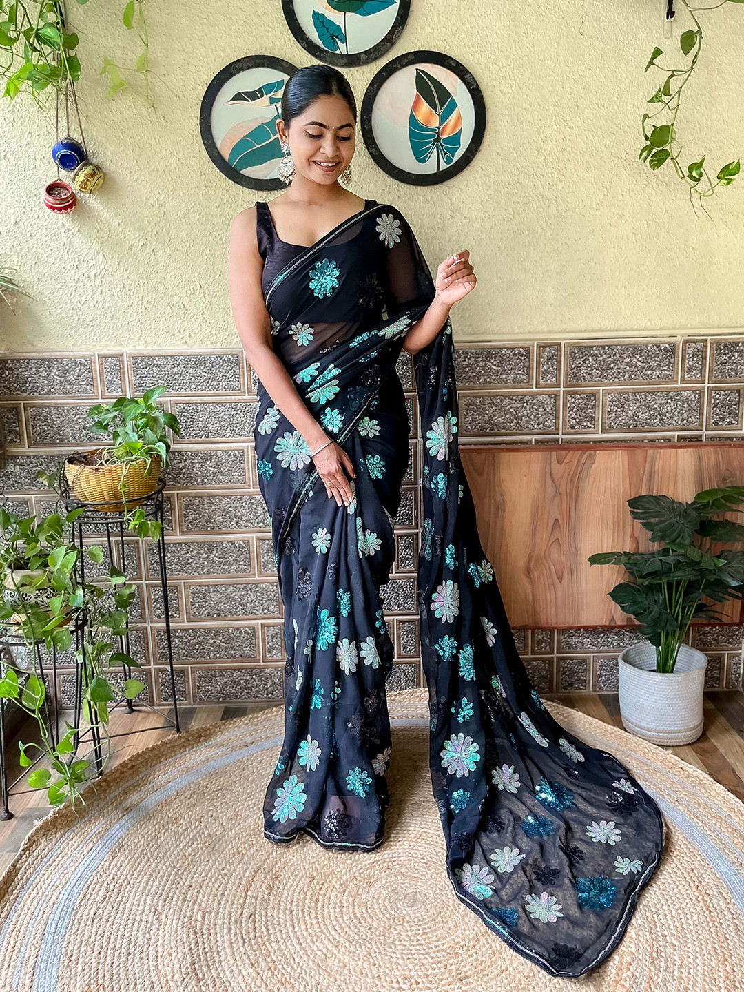 Mitera Black Embellished Sequinned Saree
Mitera Black Embellished Sequinned Saree