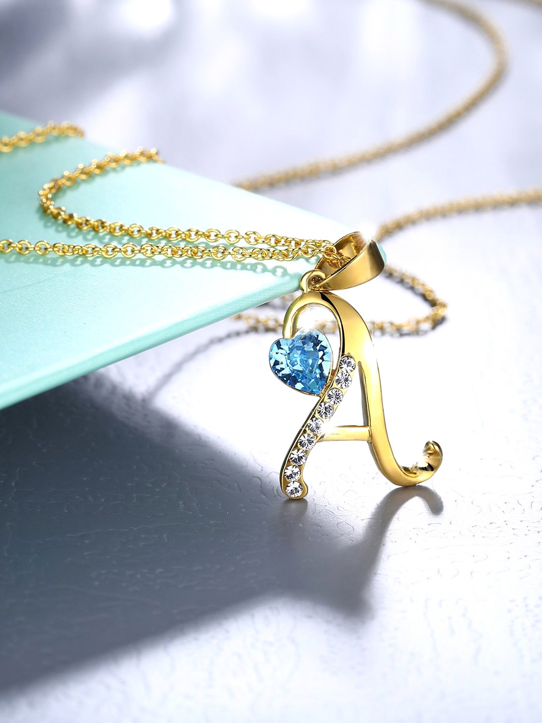 Yellow Chimes Crystals from Swarovski Collection Chimes 22K Gold Plated A-Shaped Pendant with Chain
Yellow Chimes Crystals from Swarovski Collection Chimes 22K Gold Plated A-Shaped Pendant with Chain