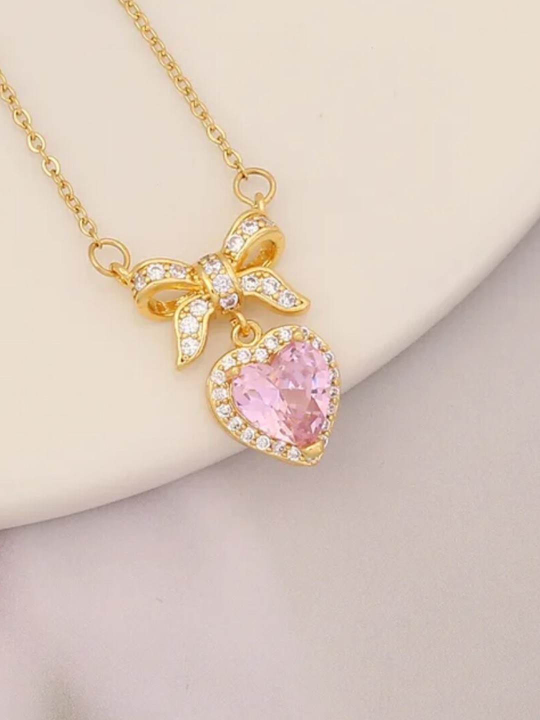 SALTY Stainless Steel Artificial Stones Studded Sweetheart Bow & Blush Necklace, Gold
SALTY Stainless Steel Artificial Stones Studded Sweetheart Bow & Blush Necklace, Gold
