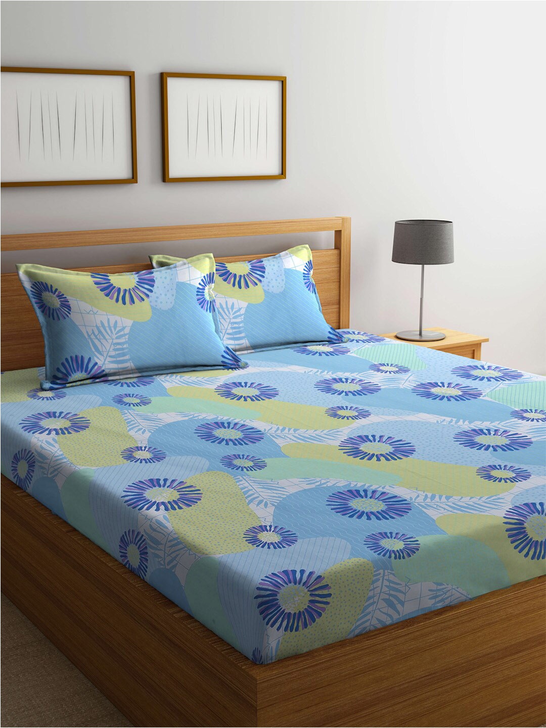 BOMBAY DYEING Serenita Blue & Green Printed Cotton 144 TC Queen Bedsheet & 2 Pillow Covers
BOMBAY DYEING Serenita Blue & Green Printed Cotton 144 TC Queen Bedsheet & 2 Pillow Covers