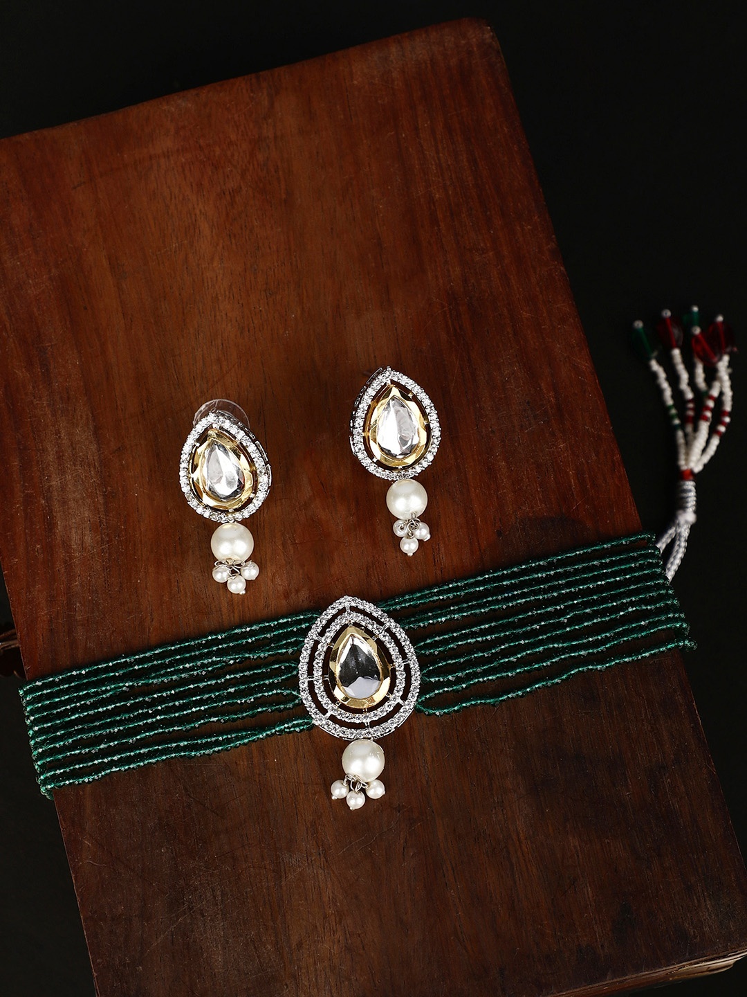 ZaffreCollections Gold-Plated American Diamond Studded Meenakari Necklace With Earrings
ZaffreCollections Gold-Plated American Diamond Studded Meenakari Necklace With Earrings