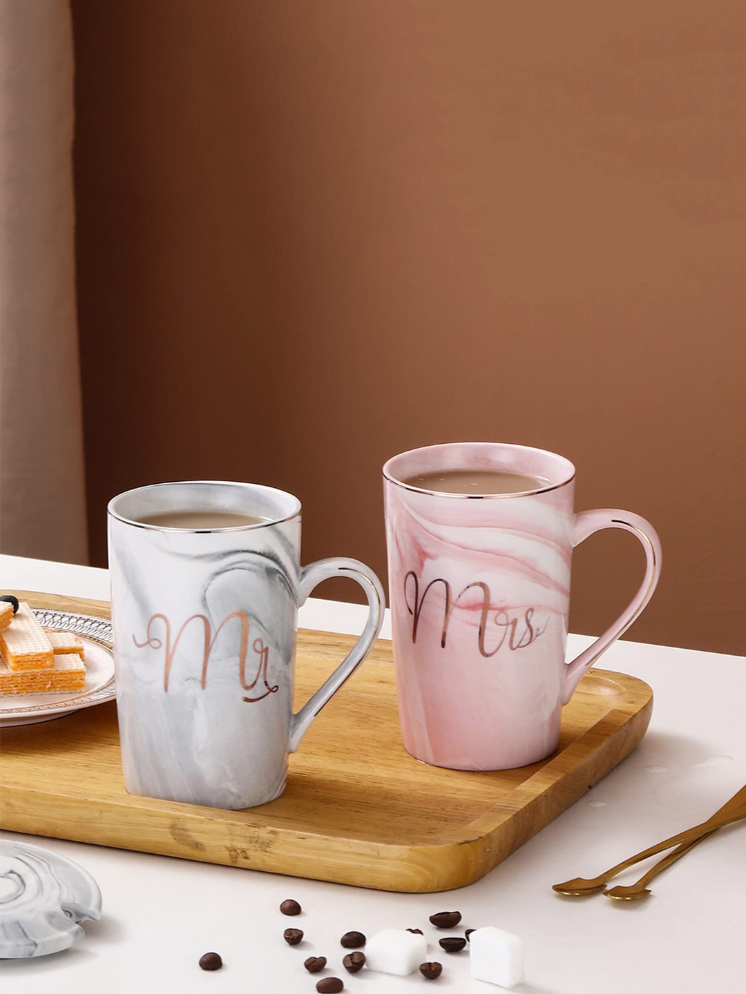 Sasimo 2 Pcs Pink & Grey Printed Ceramic Couple Mugs With Lid & Spoon - 400 ML Each
Sasimo 2 Pcs Pink & Grey Printed Ceramic Couple Mugs With Lid & Spoon - 400 ML Each