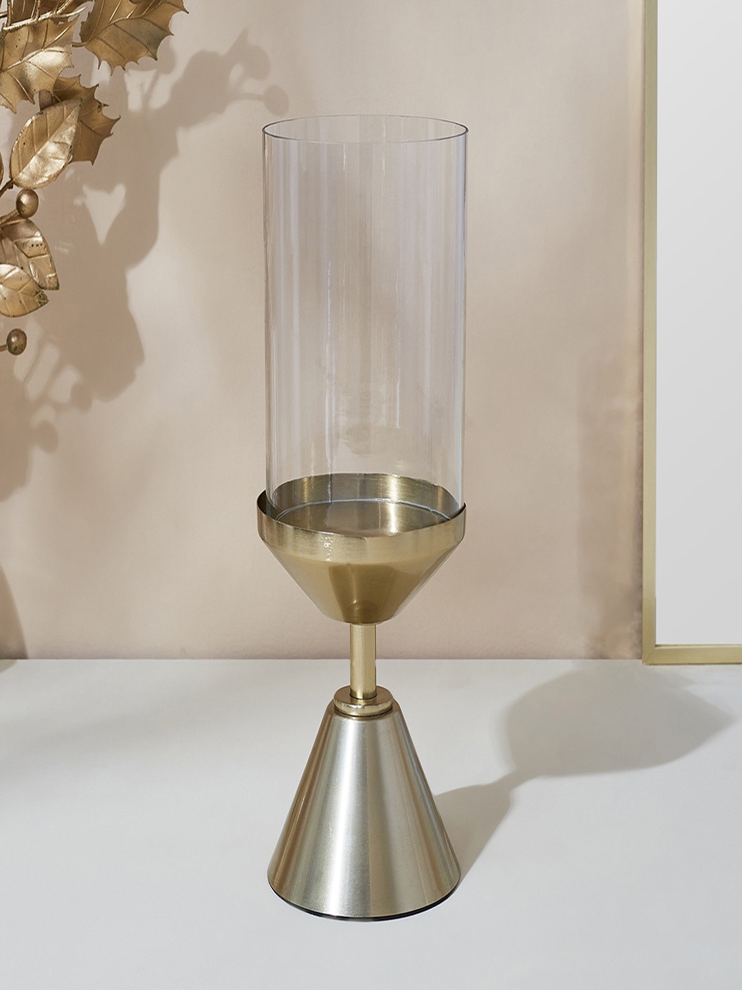 Home Centre Splendid Terra Roza Golden & Transparent Hurricane Glass Candle Holder, Gold
Home Centre Splendid Terra Roza Golden & Transparent Hurricane Glass Candle Holder, Gold