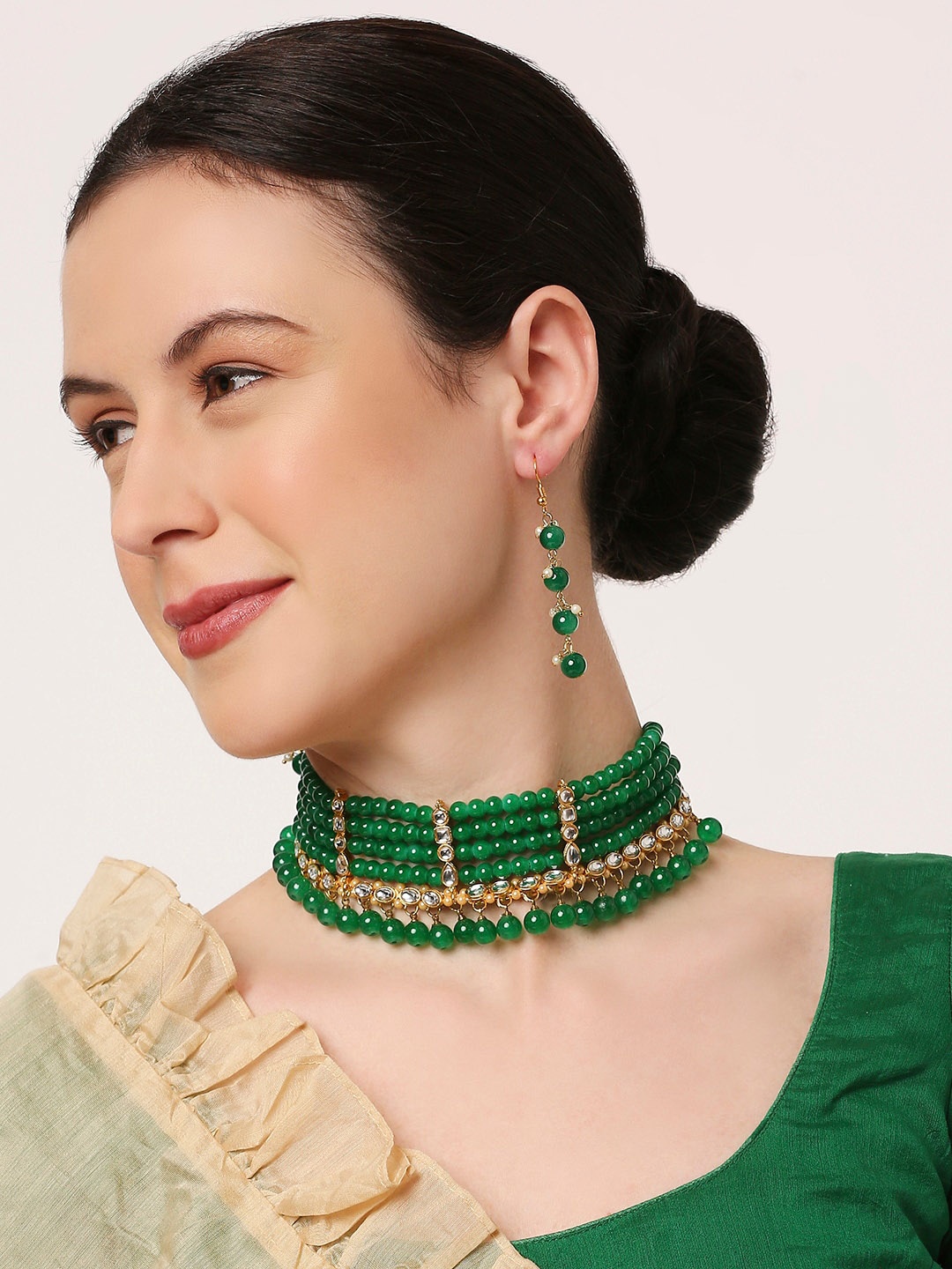 OOMPH Artificial Stone-Studded & Artificial Pearl Beaded Choker Jadau Jewellery Set, Gold
OOMPH Artificial Stone-Studded & Artificial Pearl Beaded Choker Jadau Jewellery Set, Gold