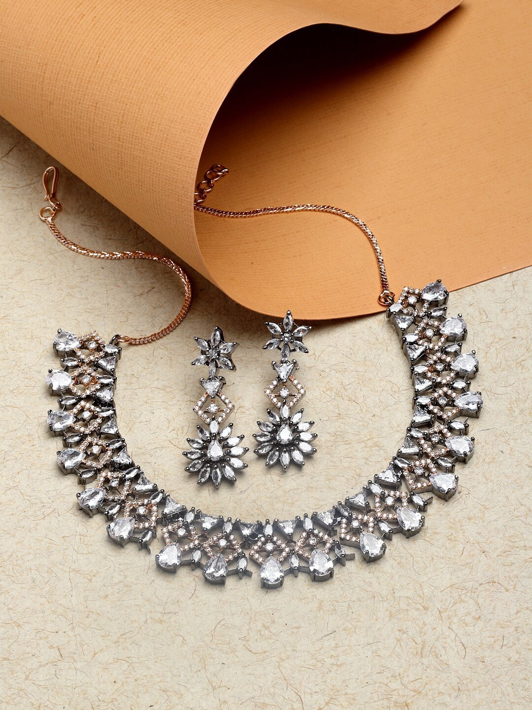 ZENEME Rose Gold-Plated Dribble Shape American Diamond Studded & Beaded Jewellery Set
ZENEME Rose Gold-Plated Dribble Shape American Diamond Studded & Beaded Jewellery Set