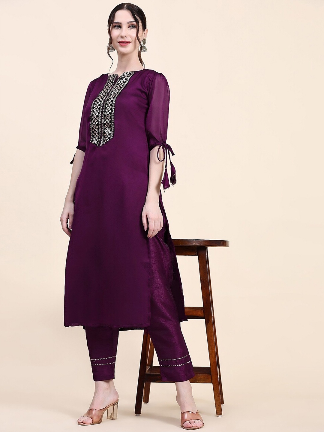 UDBHAV TEXTILE Ethnic Motifs Yoke Design Regular Sequinned Kurti with Trousers, Purple
UDBHAV TEXTILE Ethnic Motifs Yoke Design Regular Sequinned Kurti with Trousers, Purple