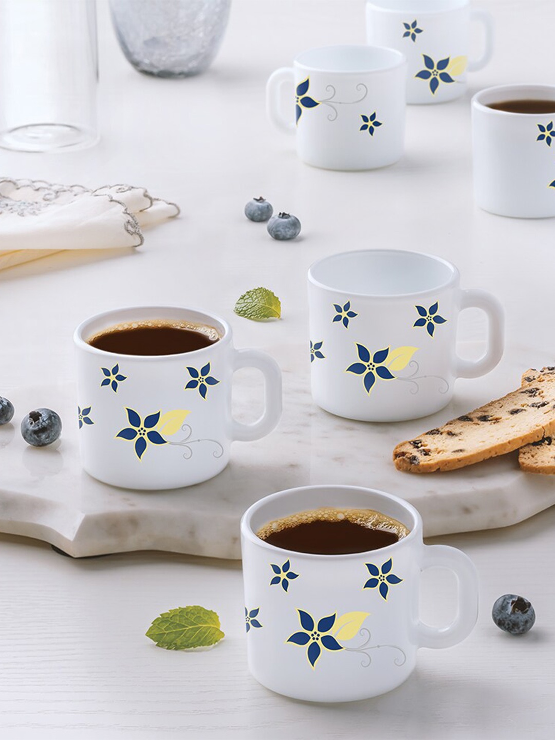 Larah by BOROSIL Navy Blue & White 6 Pcs Floral Printed Opalware Matte Mugs - 100 ML Each
Larah by BOROSIL Navy Blue & White 6 Pcs Floral Printed Opalware Matte Mugs - 100 ML Each