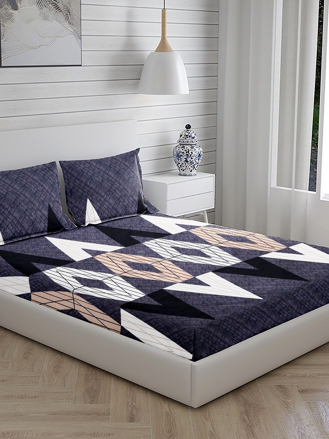 Stylespace by Isha Purple & White Printed Cotton 250 TC King Bedsheet with 2 Pillow Covers
Stylespace by Isha Purple & White Printed Cotton 250 TC King Bedsheet with 2 Pillow Covers