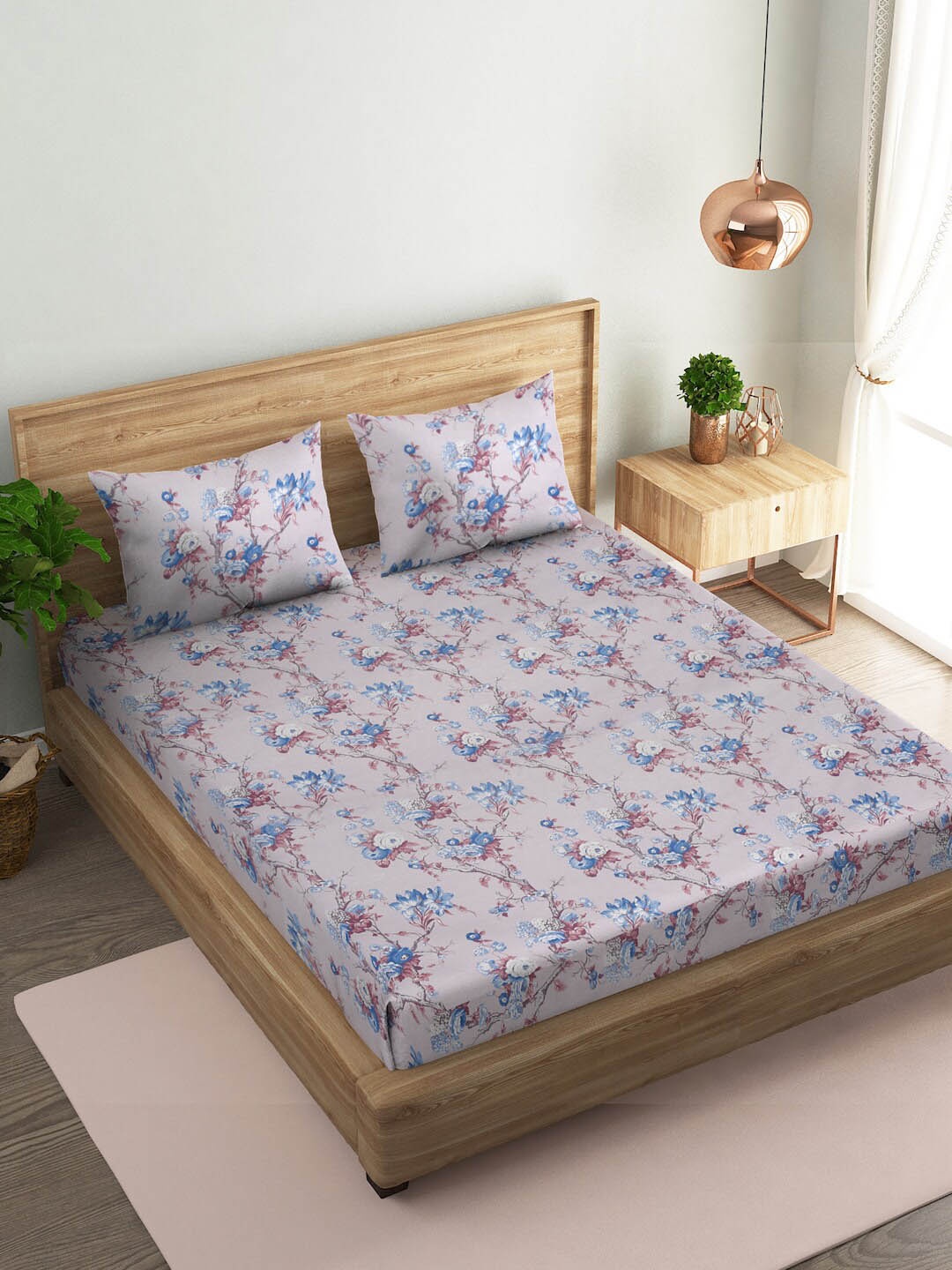 Naksh Pink & Blue Floral Printed Cotton 144 TC Cotton King Bedsheet with 2 Pillow Covers
Naksh Pink & Blue Floral Printed Cotton 144 TC Cotton King Bedsheet with 2 Pillow Covers