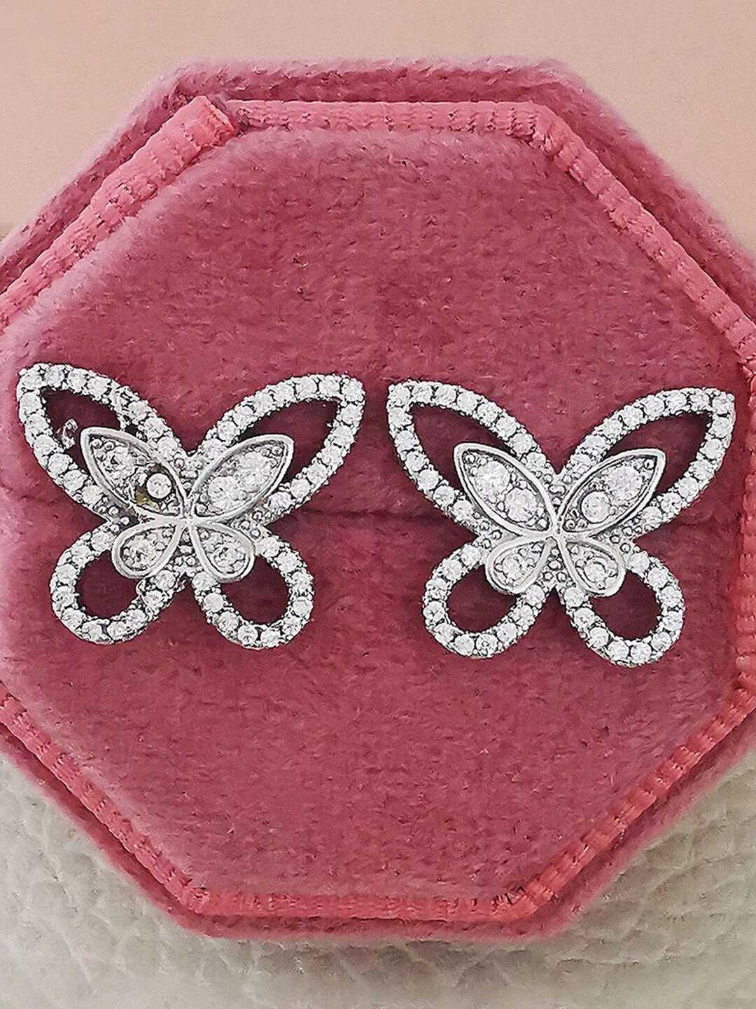 Designs & You Silver-Plated Cubic Zirconia-Studded Butterfly Shaped Studs Earrings
Designs & You Silver-Plated Cubic Zirconia-Studded Butterfly Shaped Studs Earrings