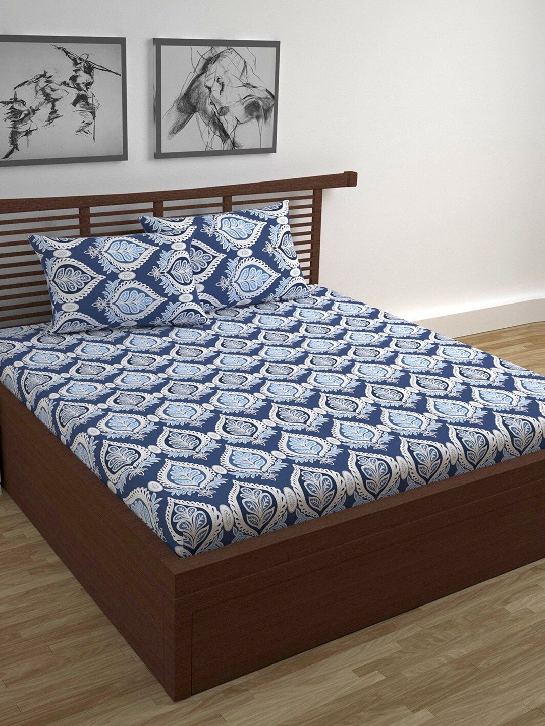 Divine Casa Prisham Blue & White Printed Cotton 144 TC Queen Bedsheet with 2 Pillow Covers
Divine Casa Prisham Blue & White Printed Cotton 144 TC Queen Bedsheet with 2 Pillow Covers