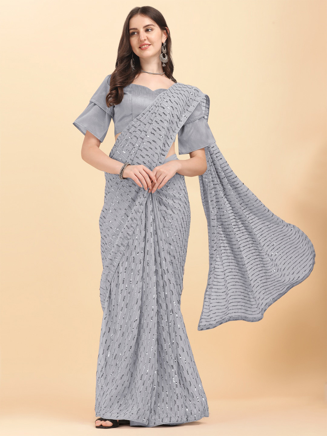 KALINI Embellished Sequinned Pure Georgette Saree, Grey
KALINI Embellished Sequinned Pure Georgette Saree, Grey