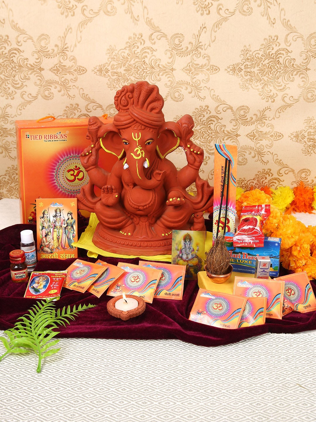 TIED RIBBONS Eco Friendly Clay Ganesha Idol With Thali Diya Pooja Home Gift Sets, Multi
TIED RIBBONS Eco Friendly Clay Ganesha Idol With Thali Diya Pooja Home Gift Sets, Multi