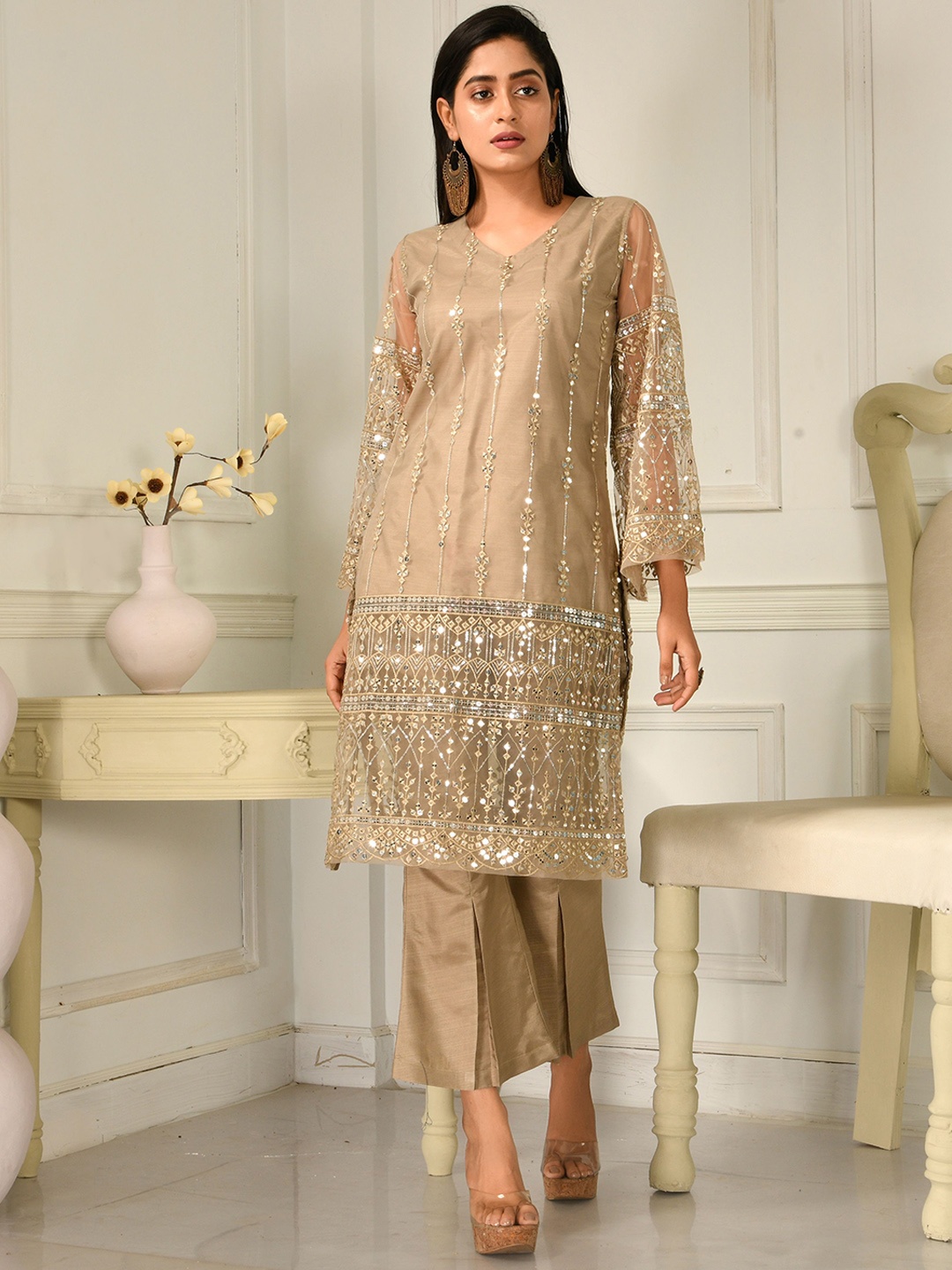 Disli Embroidered Regular Mirror Work V-Neck Net Straight Kurta with Palazzos, Beige
Disli Embroidered Regular Mirror Work V-Neck Net Straight Kurta with Palazzos, Beige