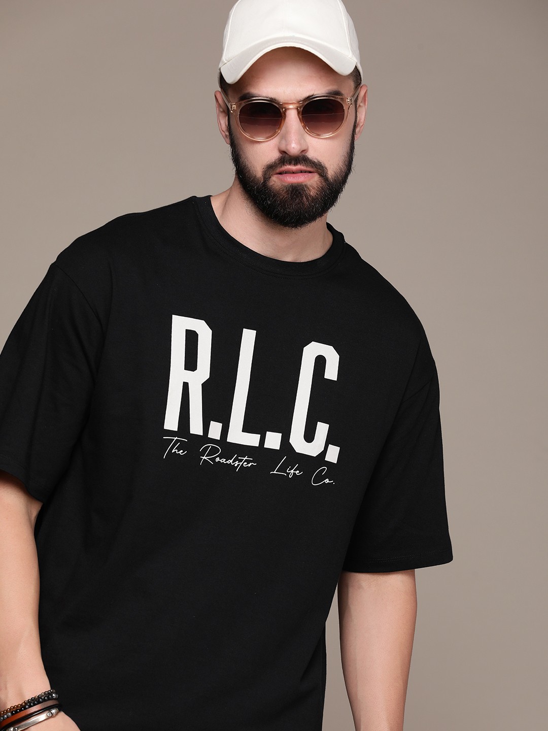 The Roadster Lifestyle Co. Oversized Fit Typography Printed Drop-Shoulder Sleeves Pure Cotton T-shirt, Black
The Roadster Lifestyle Co. Oversized Fit Typography Printed Drop-Shoulder Sleeves Pure Cotton T-shirt, Black