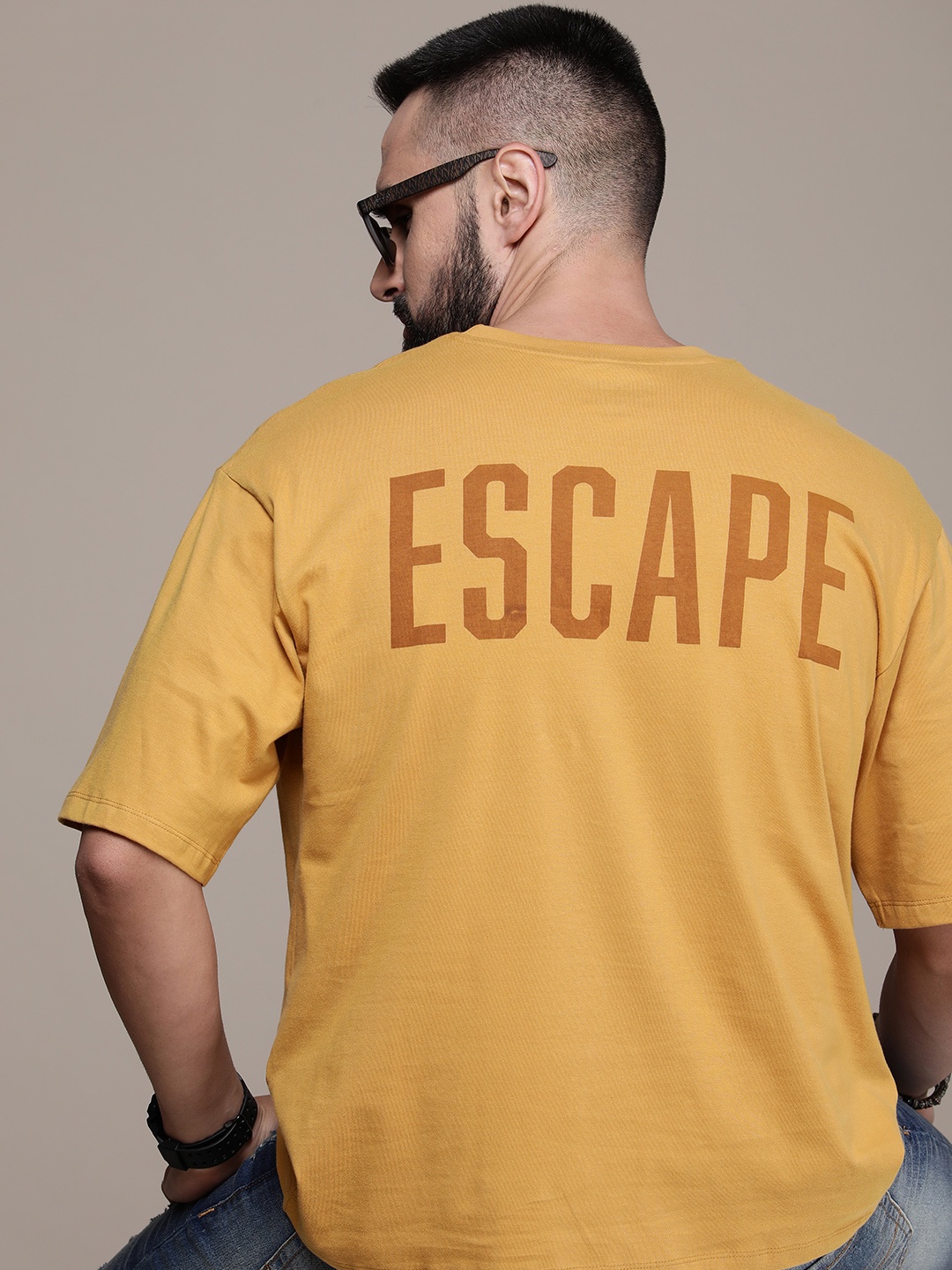 The Roadster Lifestyle Co. Oversized Fit Typography Printed Drop-Shoulder Pure Cotton T-shirt, Mustard
The Roadster Lifestyle Co. Oversized Fit Typography Printed Drop-Shoulder Pure Cotton T-shirt, Mustard
