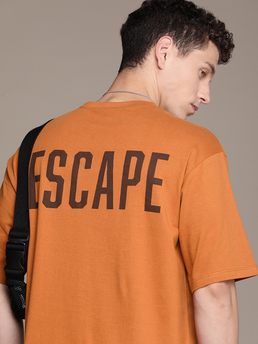 The Roadster Lifestyle Co. Oversized Fit Men Typography Printed Pure Cotton T-shirt, Orange
The Roadster Lifestyle Co. Oversized Fit Men Typography Printed Pure Cotton T-shirt, Orange