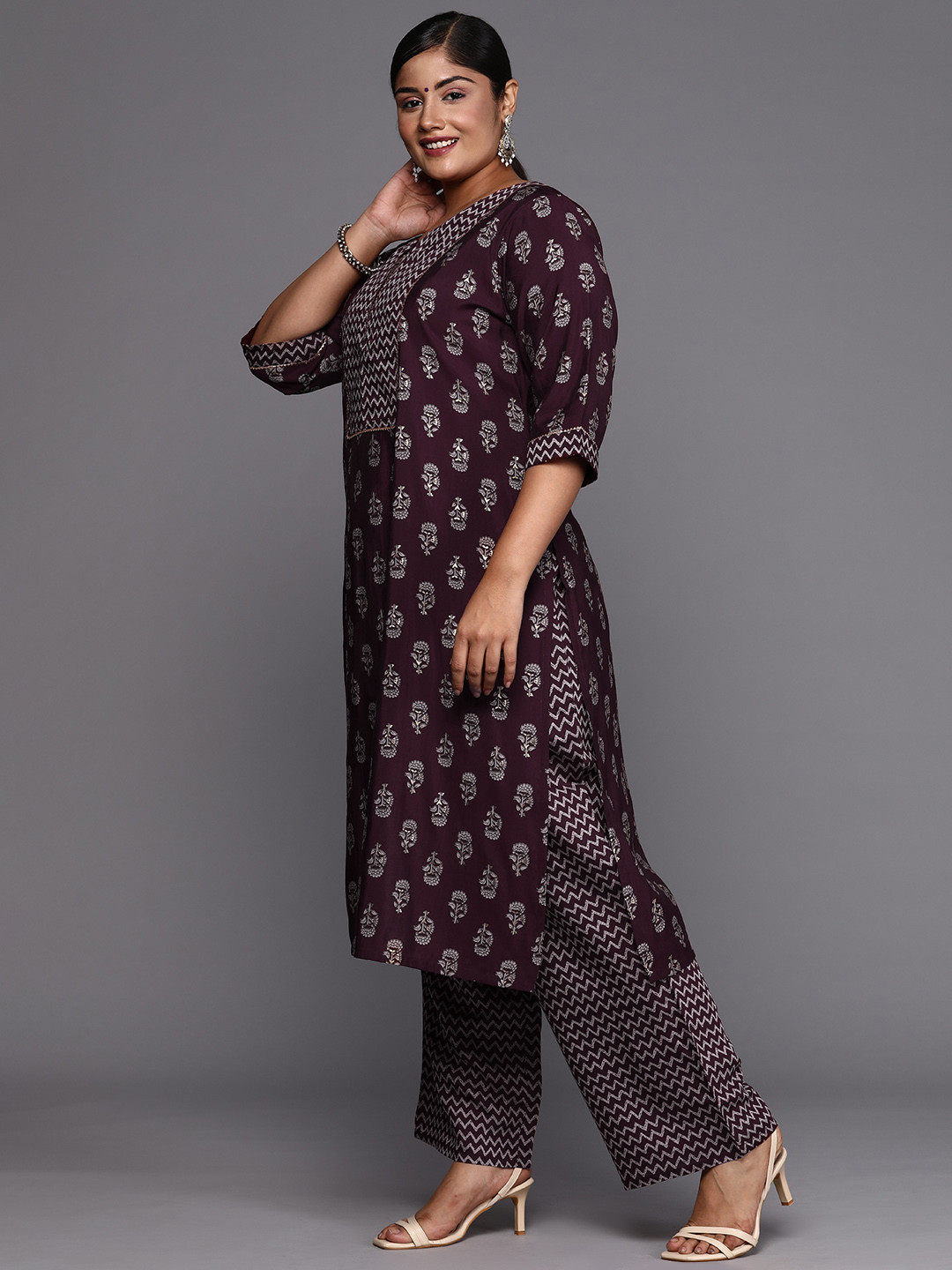 EXTRA LOVE BY LIBAS Women Plus Size Ethnic Motifs Printed Gotta Patti Kurta with Palazzos, Burgundy
EXTRA LOVE BY LIBAS Women Plus Size Ethnic Motifs Printed Gotta Patti Kurta with Palazzos, Burgundy