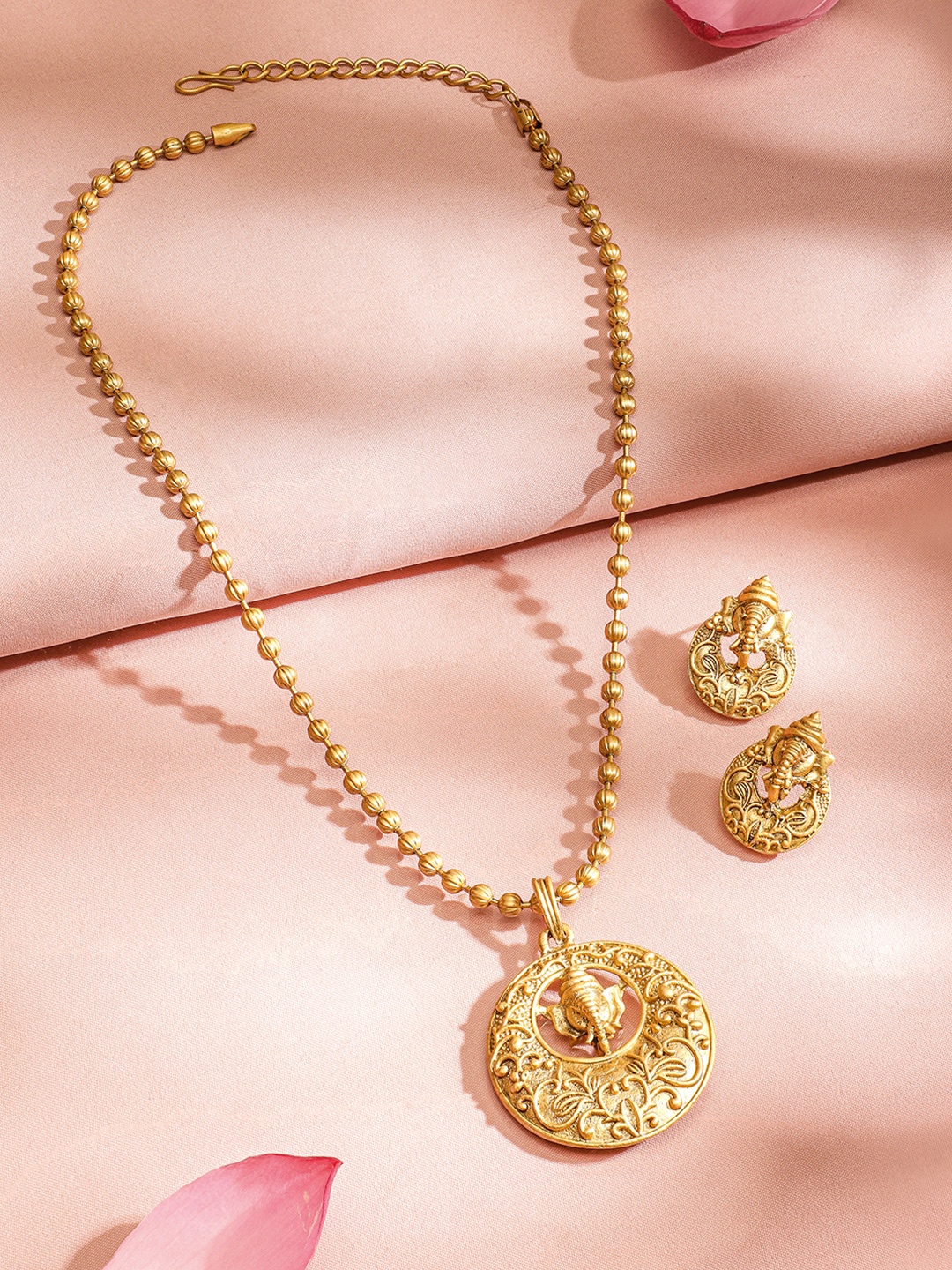 Rubans Divine 22K Gold Plated Ganesh Motif with Golden Beaded Temple Pendent Jewellery Set
Rubans Divine 22K Gold Plated Ganesh Motif with Golden Beaded Temple Pendent Jewellery Set