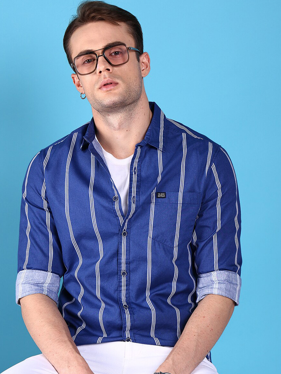 The Indian Garage Co Blue Slim Fit Vertical Striped Spread Collar Cotton Casual Shirt
The Indian Garage Co Blue Slim Fit Vertical Striped Spread Collar Cotton Casual Shirt