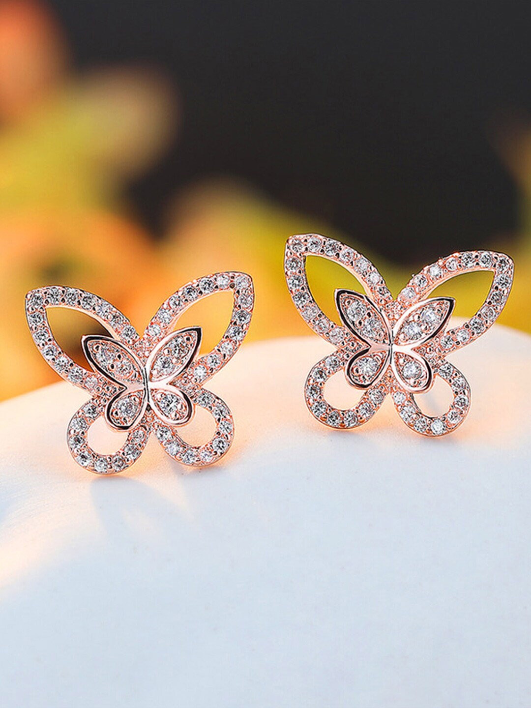 Designs & You Rose Gold Plated American Diamond Studded Butterfly Shaped Studs Earrings
Designs & You Rose Gold Plated American Diamond Studded Butterfly Shaped Studs Earrings
