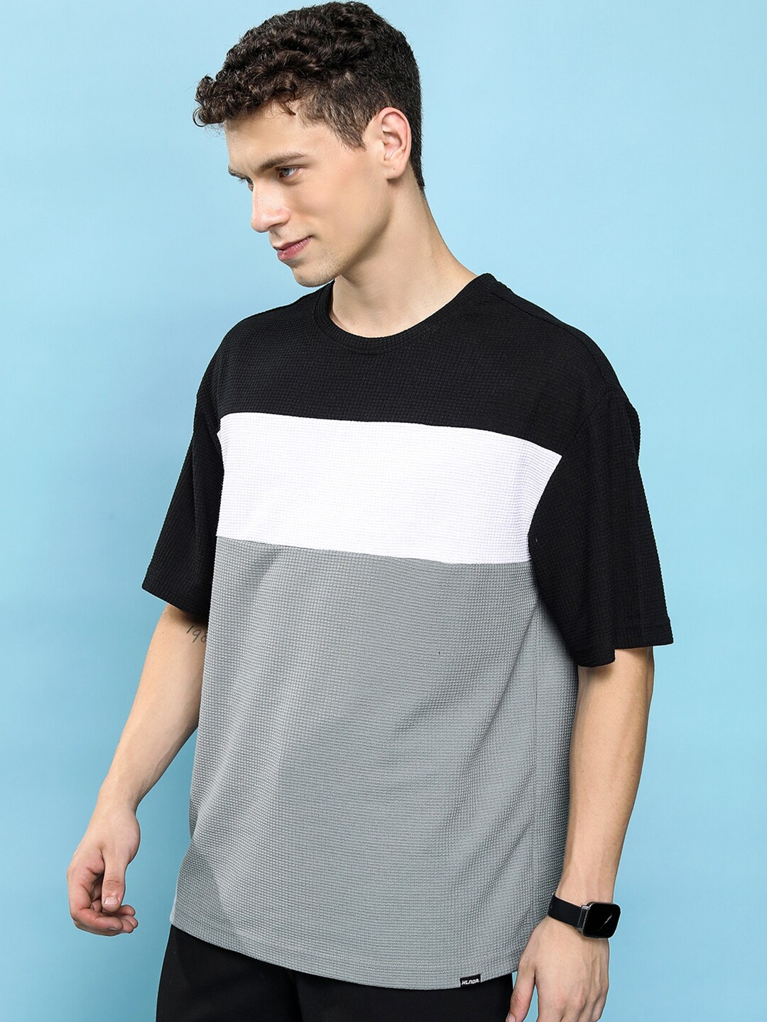 HIGHLANDER Colourblocked Drop-Shoulder Sleeves Oversized Popcorn Structured T-Shirt, Black
HIGHLANDER Colourblocked Drop-Shoulder Sleeves Oversized Popcorn Structured T-Shirt, Black