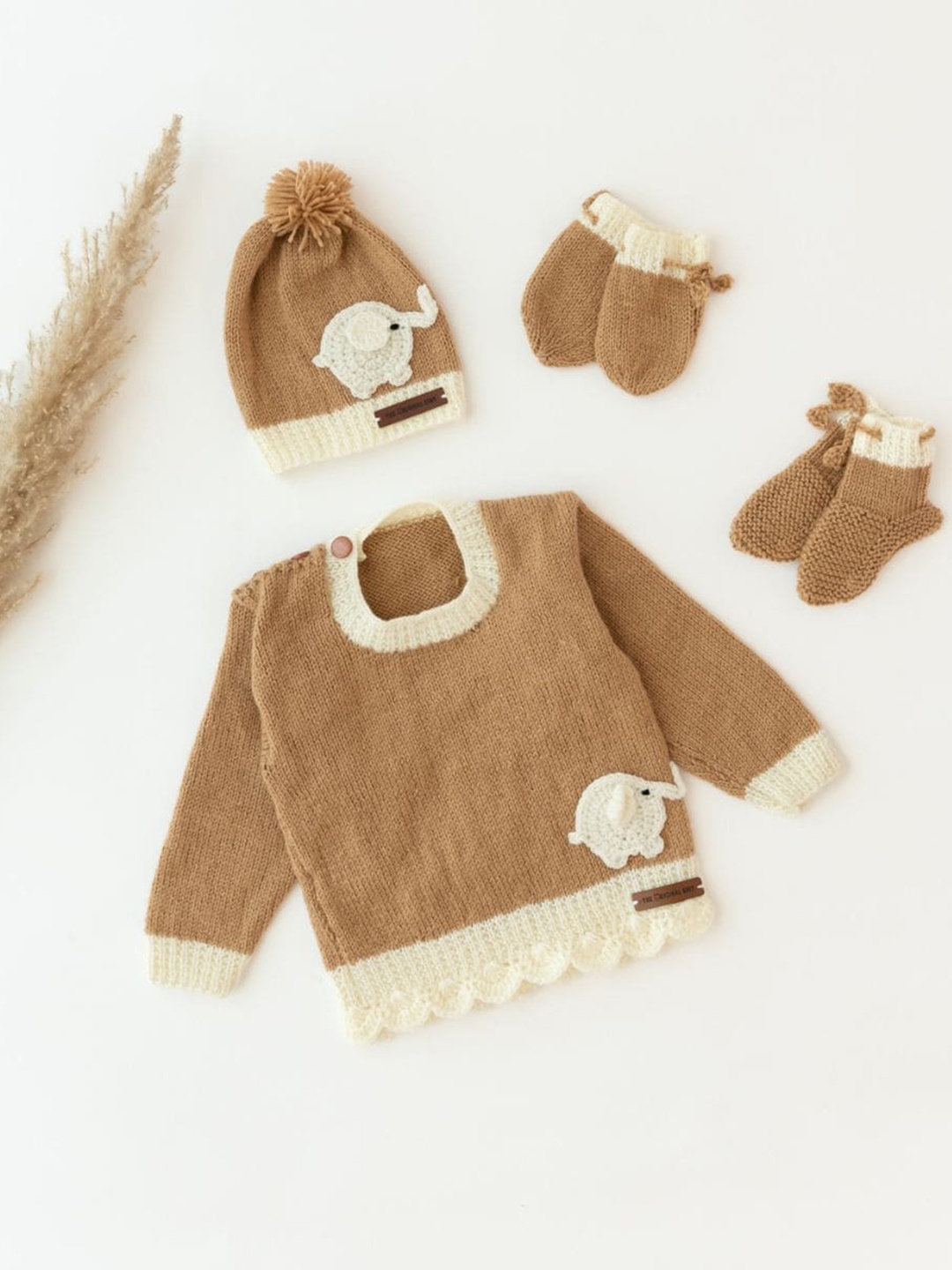 The Original Knit Unisex Kids Brown & Cream-Coloured Cable Knit Pullover with Embroidered Detail
The Original Knit Unisex Kids Brown & Cream-Coloured Cable Knit Pullover with Embroidered Detail