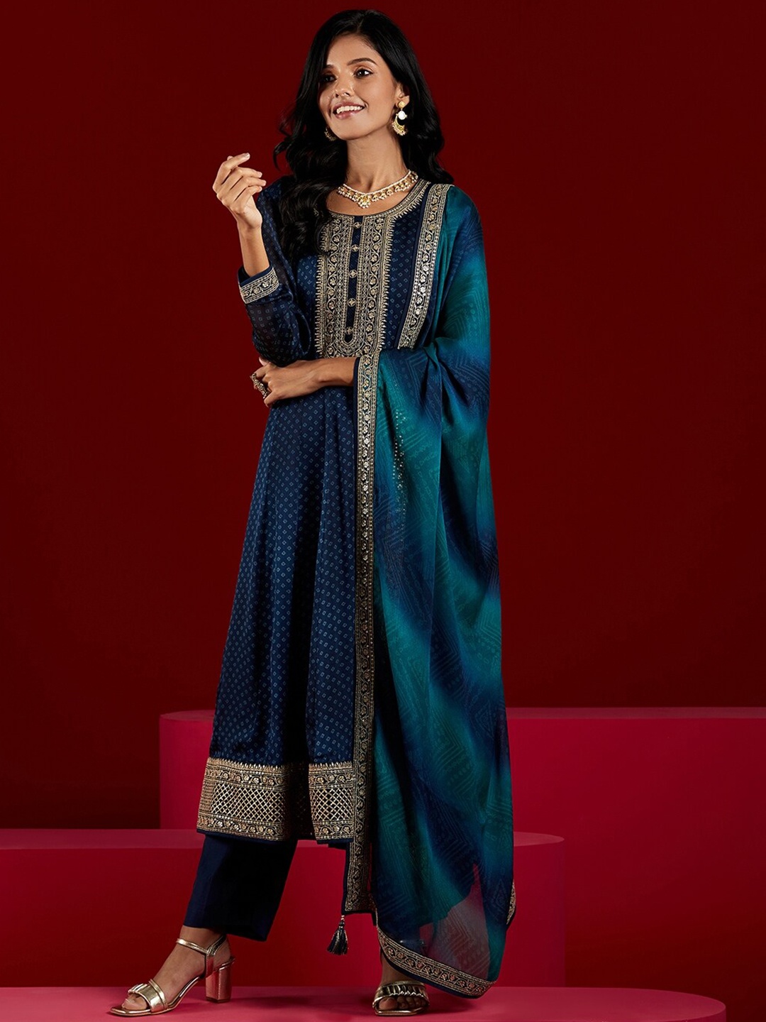 Libas Art Bandhani Yoke Design Panelled Sequinned Kurta with Trousers & Dupatta, Navy blue
Libas Art Bandhani Yoke Design Panelled Sequinned Kurta with Trousers & Dupatta, Navy blue