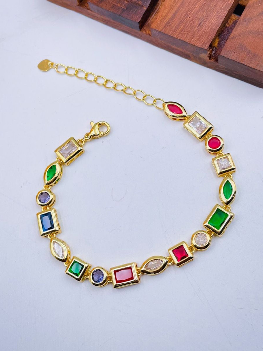 ZIVOM Brass Cubic Zirconia Gold-Plated Link Bracelet
ZIVOM Brass Cubic Zirconia Gold-Plated Link Bracelet