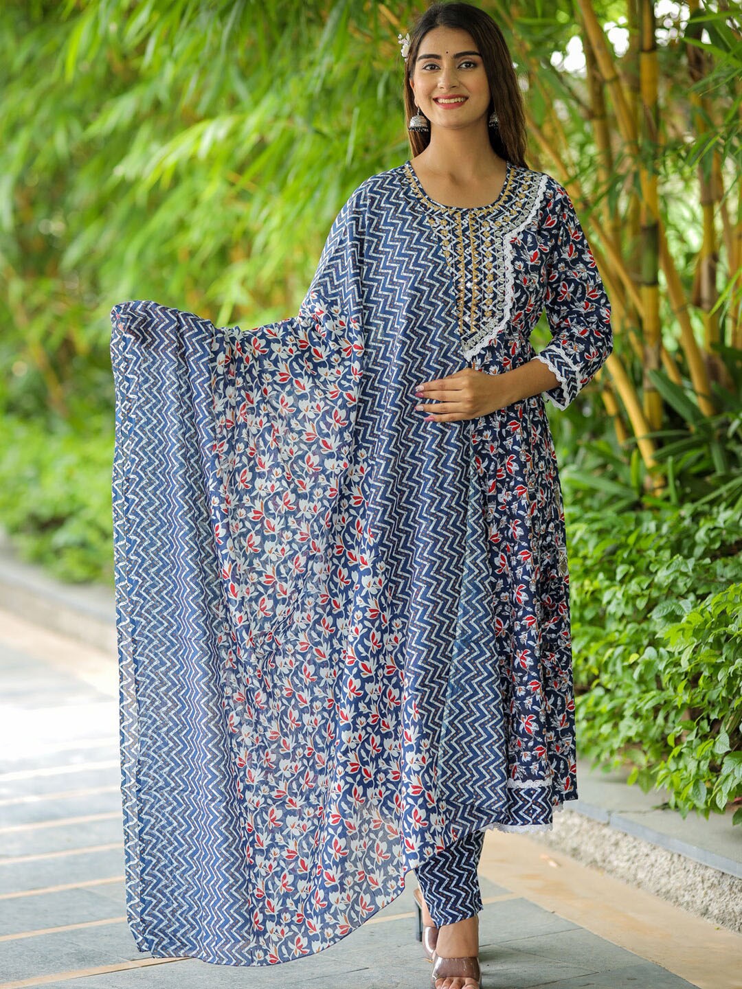 KALINI Floral Embroidered Pure Cotton Anarkali Kurta with Trousers & With Dupatta, Blue
KALINI Floral Embroidered Pure Cotton Anarkali Kurta with Trousers & With Dupatta, Blue