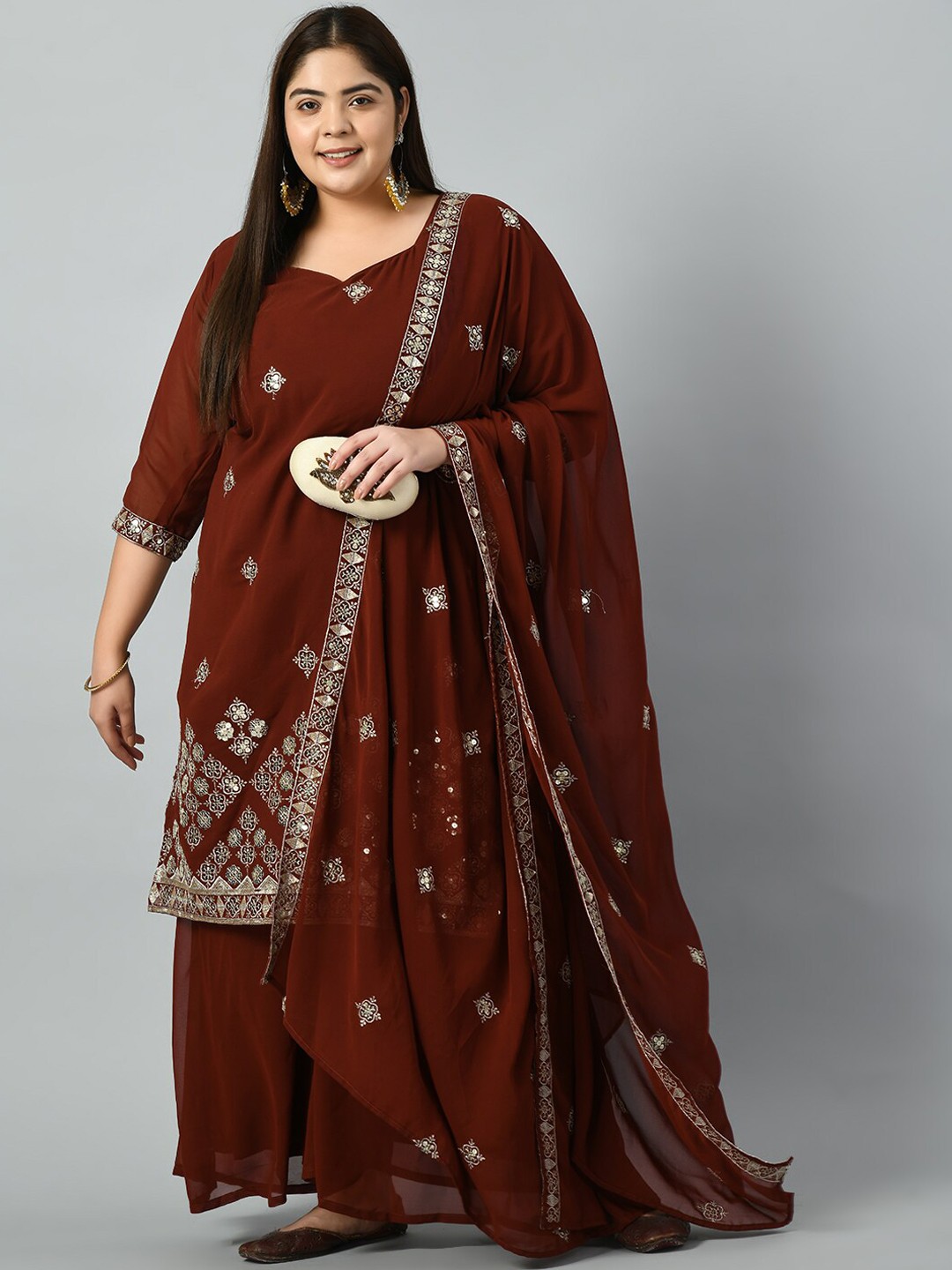 PrettyPlus by Desinoor.com Ethnic Motifs Embroidered Kurta with Sharara & Dupatta, Rust
PrettyPlus by Desinoor.com Ethnic Motifs Embroidered Kurta with Sharara & Dupatta, Rust