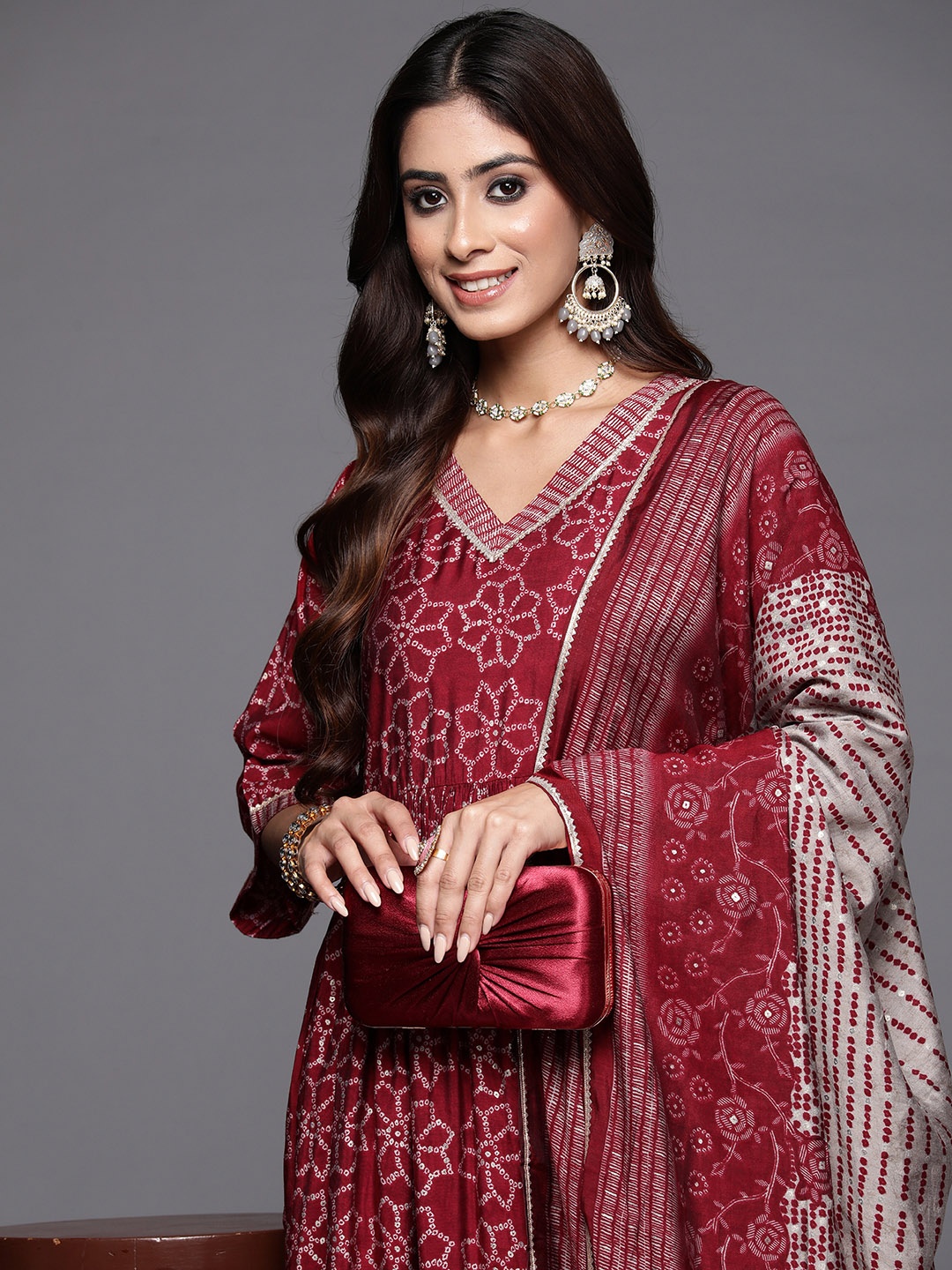 Libas Women Bandhani Printed Pleated Gotta Patti Kurta with Trousers & With Dupatta, Maroon
Libas Women Bandhani Printed Pleated Gotta Patti Kurta with Trousers & With Dupatta, Maroon