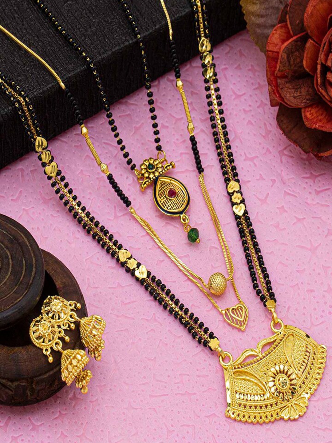 Ramdev Art Fashion Jwellery Gold-Plated Mangalsutra & Chain With Necklace & Earrings
Ramdev Art Fashion Jwellery Gold-Plated Mangalsutra & Chain With Necklace & Earrings