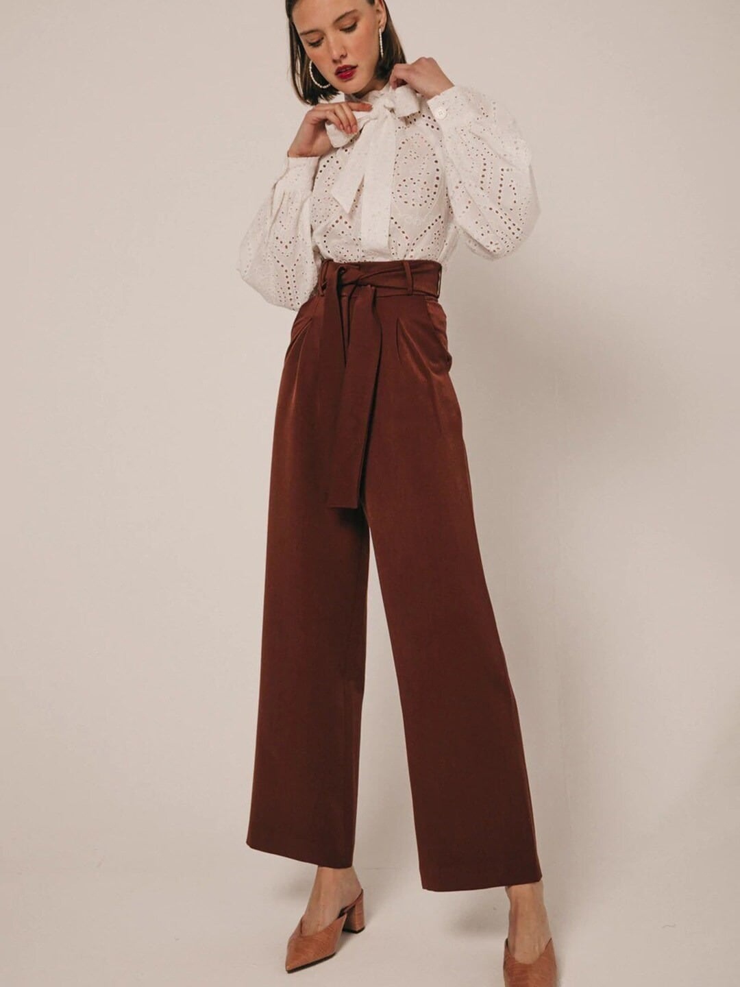 KHUSHBOO AND PANKAJ Women Brown Smart Straight Fit High-Rise Non Iron Pleated Trousers
KHUSHBOO AND PANKAJ Women Brown Smart Straight Fit High-Rise Non Iron Pleated Trousers