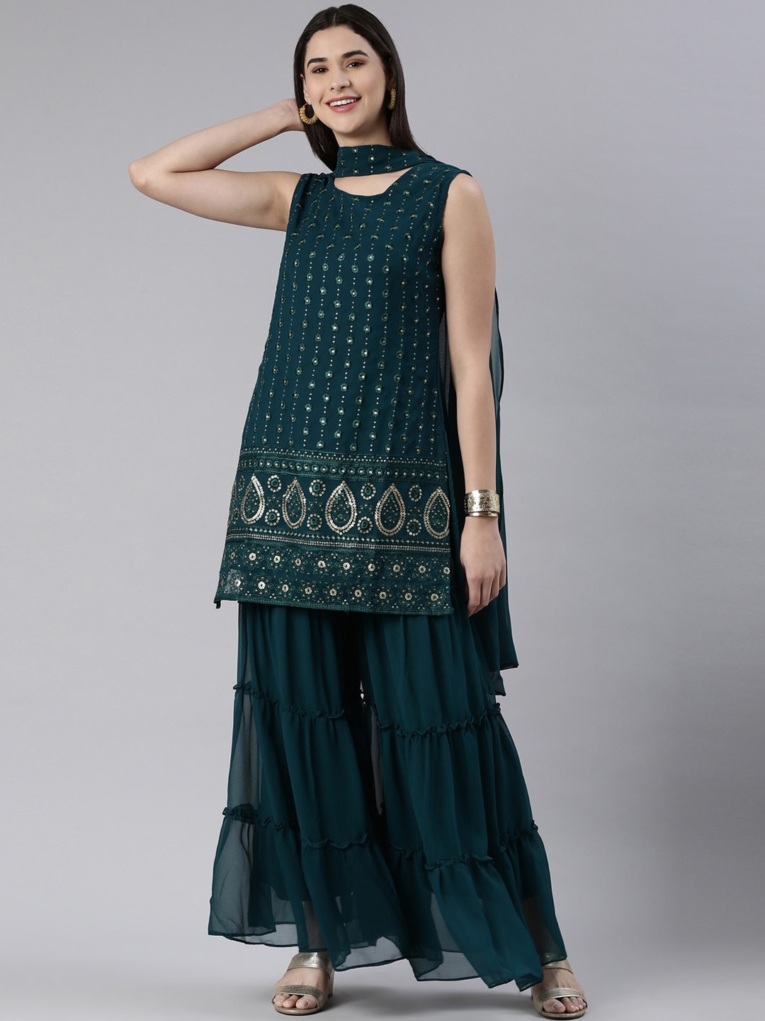 BLACK SCISSOR Ethnic Motifs Embroidered Sequinned Straight Kurta & Sharara With Dupatta, Teal
BLACK SCISSOR Ethnic Motifs Embroidered Sequinned Straight Kurta & Sharara With Dupatta, Teal