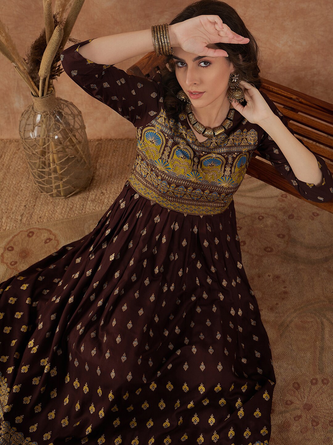 Sangria Brown & Gold Toned Ethnic Motifs Printed V Neck Gathered Maxi Ethnic Dress
Sangria Brown & Gold Toned Ethnic Motifs Printed V Neck Gathered Maxi Ethnic Dress