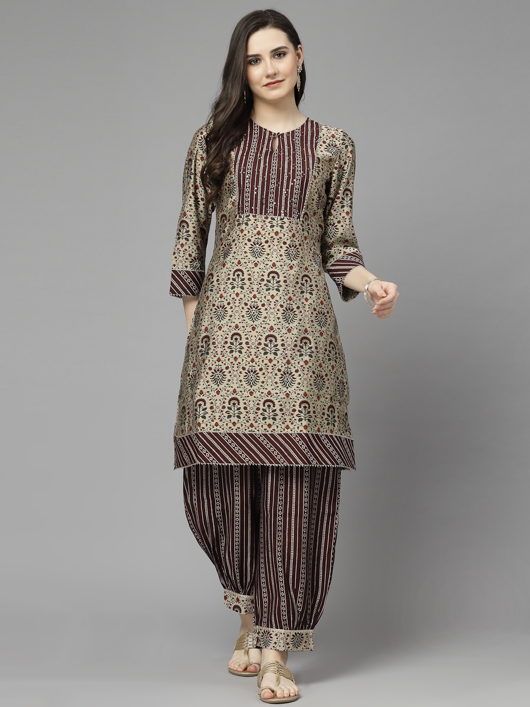 Nayam By Lakshita Women Beige Floral Printed Regular Sequinned Chanderi Cotton Kurta with Salwar
Nayam By Lakshita Women Beige Floral Printed Regular Sequinned Chanderi Cotton Kurta with Salwar
