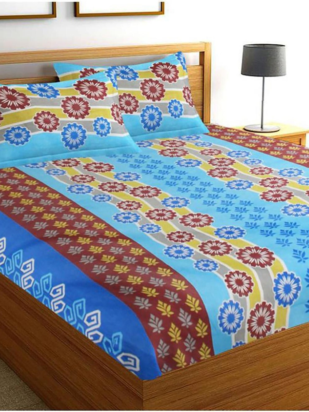 HOMETALES Blue & Yellow Floral Printed Cotton 144 TC King Bedsheet With 2 Pillow Covers
HOMETALES Blue & Yellow Floral Printed Cotton 144 TC King Bedsheet With 2 Pillow Covers