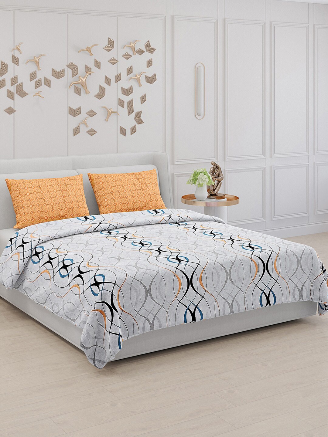 Monte Carlo White & Orange Geometric Polyester 130 TC King Bedsheet With 2 Pillow Covers
Monte Carlo White & Orange Geometric Polyester 130 TC King Bedsheet With 2 Pillow Covers