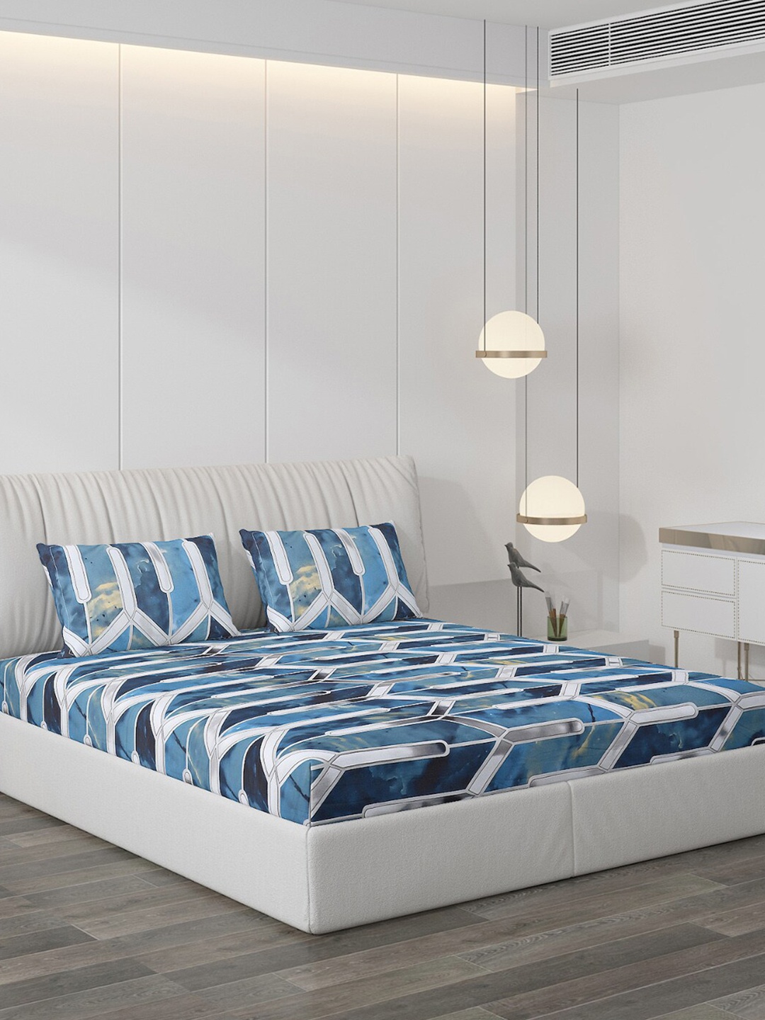 Monte Carlo Teal & White Geometric Polyester 130 TC King Bedsheet With 2 Pillow Covers
Monte Carlo Teal & White Geometric Polyester 130 TC King Bedsheet With 2 Pillow Covers