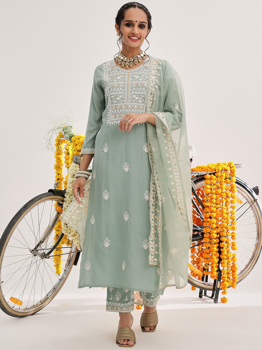 Varanga Sea Green Floral Embroidered Thread Work Straight Kurta With Trousers & Dupatta
Varanga Sea Green Floral Embroidered Thread Work Straight Kurta With Trousers & Dupatta