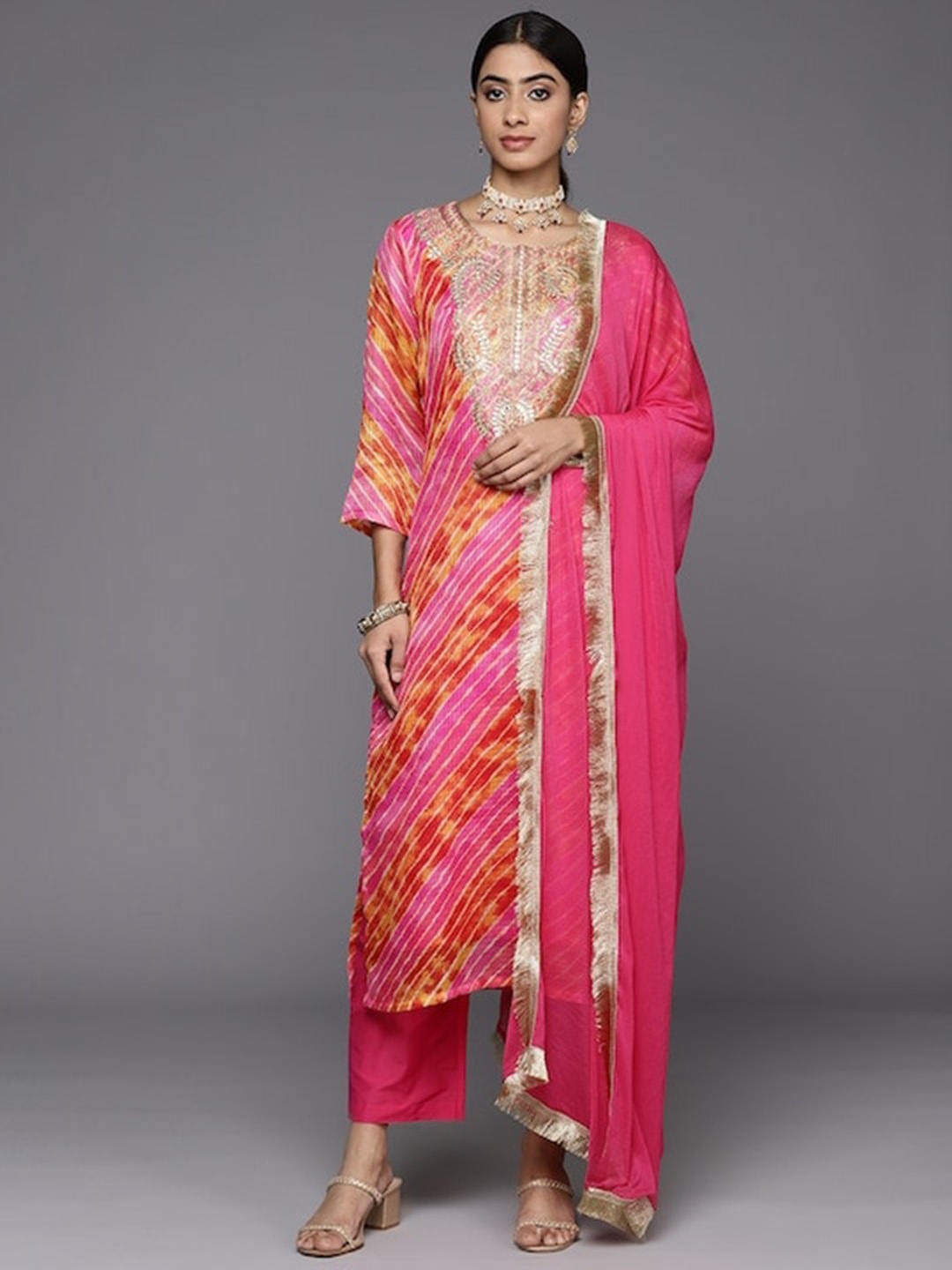 Varanga Pink Leheriya Printed Thread Work Straight Kurta & Trousers & With Dupatta
Varanga Pink Leheriya Printed Thread Work Straight Kurta & Trousers & With Dupatta