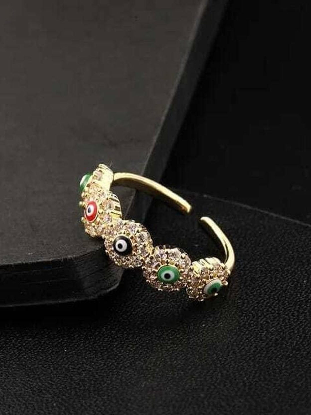 VIEN Gold-Plated Cubic Zirconia-Studded Evil Eye Stainless Steel Adjustable Finger Ring
VIEN Gold-Plated Cubic Zirconia-Studded Evil Eye Stainless Steel Adjustable Finger Ring