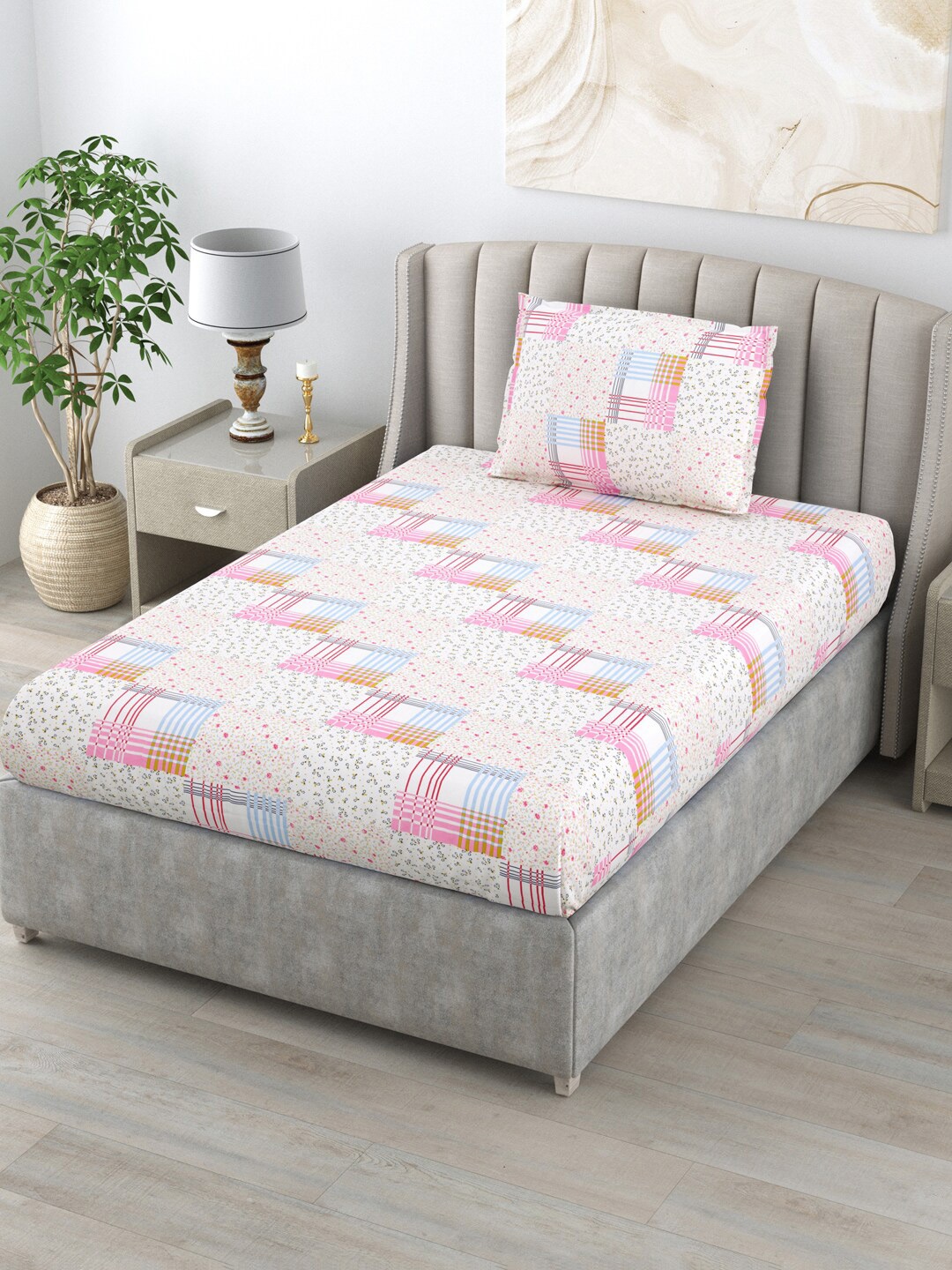 BOMBAY DYEING Allure Pink & White Floral Cotton 120 TC Single Bedsheet With 1 Pillow Cover
BOMBAY DYEING Allure Pink & White Floral Cotton 120 TC Single Bedsheet With 1 Pillow Cover
