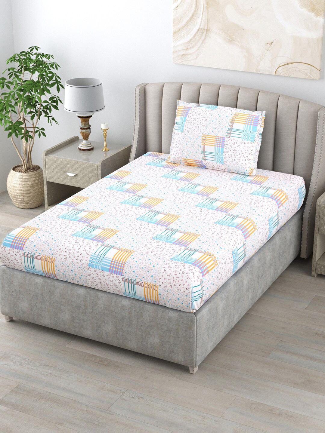 BOMBAY DYEING Allure Blue & Yellow Floral Cotton 120 TC Single Bedsheet & 1 Pillow Cover
BOMBAY DYEING Allure Blue & Yellow Floral Cotton 120 TC Single Bedsheet & 1 Pillow Cover