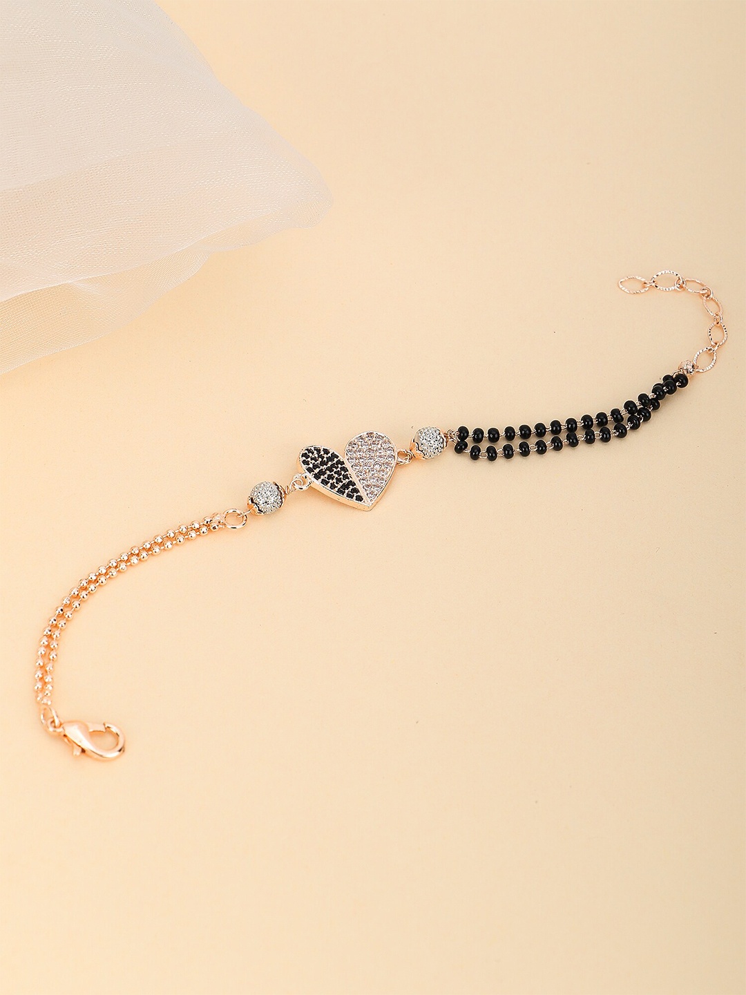 Adwitiya Collection Gold-Plated Stone Studded Heart Shape Beaded Mangalsutra Bracelet
Adwitiya Collection Gold-Plated Stone Studded Heart Shape Beaded Mangalsutra Bracelet