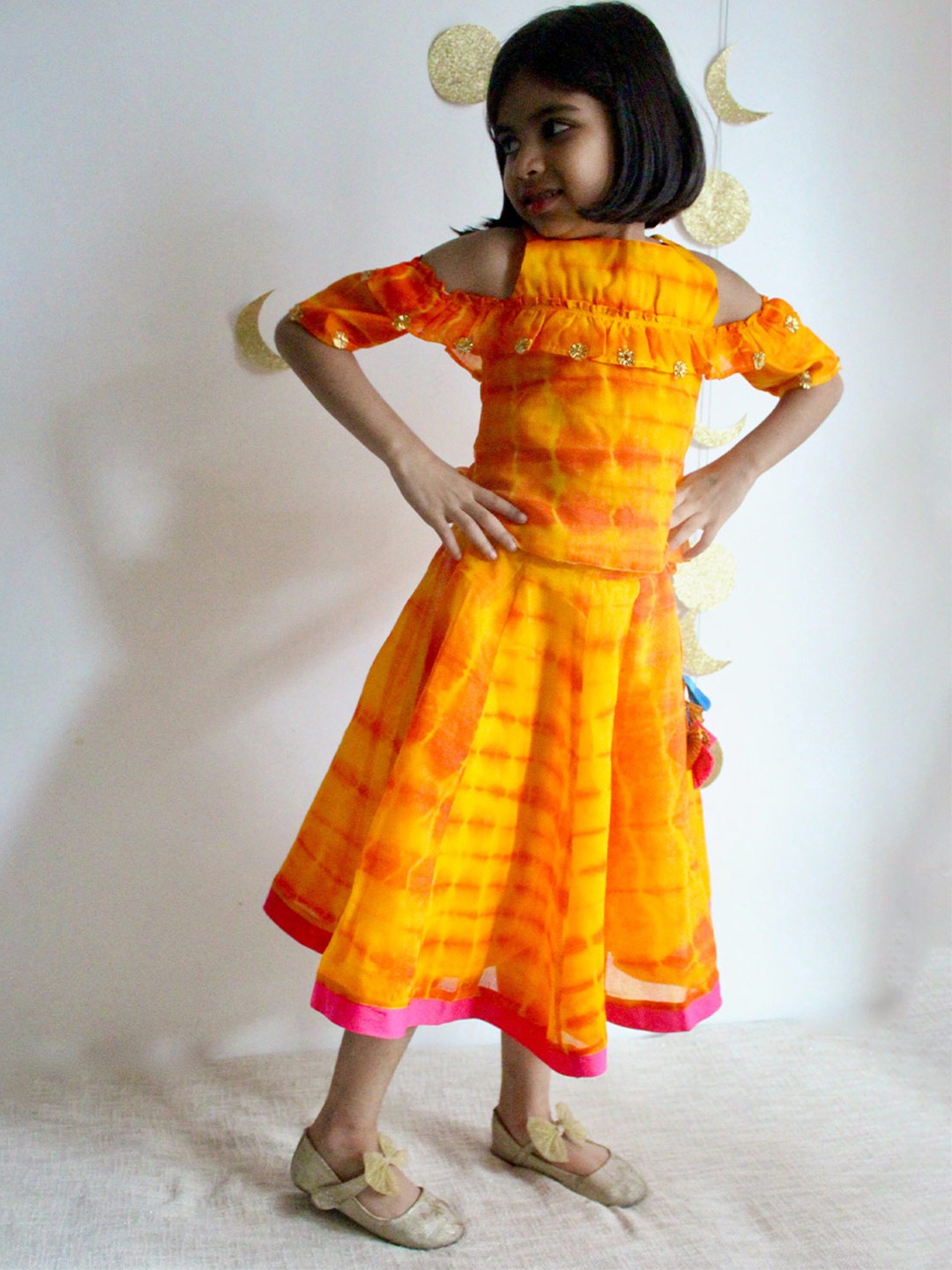 charkhee Girls Tie & Dye Dyed Cold Shoulder Sleeves Ready to Wear Lehenga & Choli, Yellow
charkhee Girls Tie & Dye Dyed Cold Shoulder Sleeves Ready to Wear Lehenga & Choli, Yellow